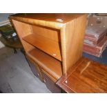 AN ART DECO WALNUT BOOKCASE WITH CUPBOARD UNDER