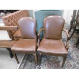 TWO LEATHER DESK CHAIRS