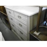 A PAINTED EDWARDIAN TWO OVER THREE CHEST OF DRAWERS