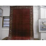 A RED GROUND RUG