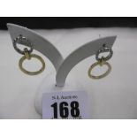 A PAIR OF YELLOW AND WHITE GOLD EARRINGS