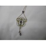 A 9CT GOLD ART NOUVEAU PENDENT