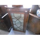 A 19TH CENTURY MAHOGANY CORNER CABINET