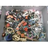 A LARGE BOX OF COSTUME JEWELLERY