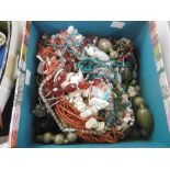 A BOX OF COSTUME JEWELLERY