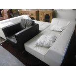 A WHITE LEATHER CONTEMPORARY CORNER SOFA