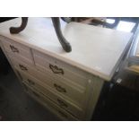 A PAINTED EDWARDIAN TWO OVER THREE CHEST OF DRAWERS