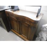 A SMALL SERPENTINE FRONTED CHIFFONIER