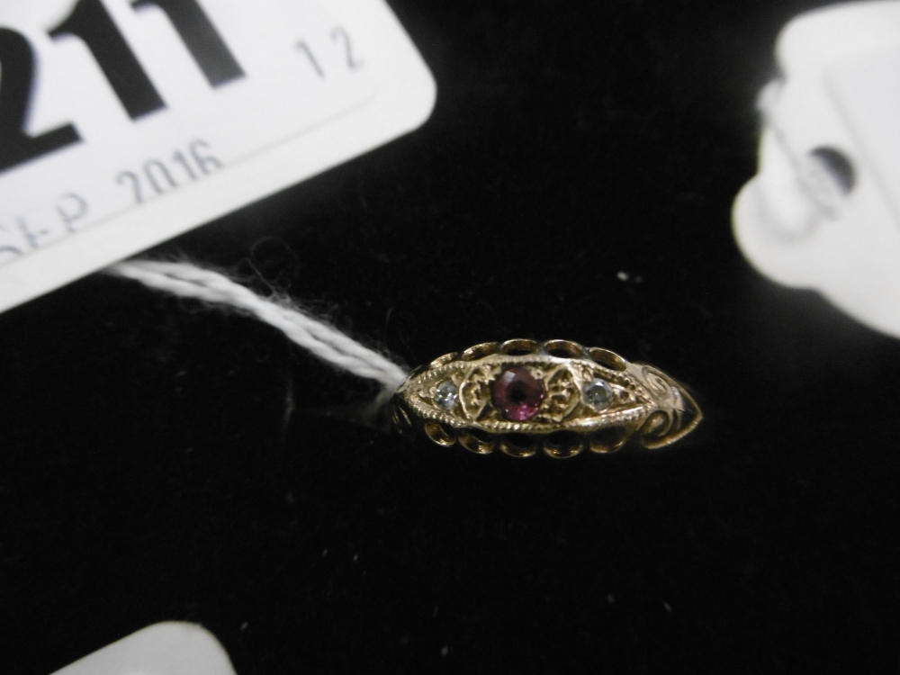 A 9CT GOLD RUBY AND DIAMOND RING