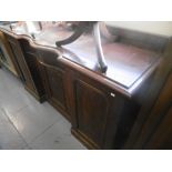 A SERPENTINE FRONTED SIDEBOARD