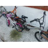 Three childrens bicycles, Muddy Fox, Hello Kitty and Hurricane