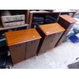 Pair of storage cupboards plus one other