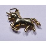 GOLD UNICORN CHARM. 9ct gold unicorn charm / pendant