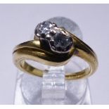 GOLD TWO DIAMOND RING. 18ct yellow gold two diamond ring, size G