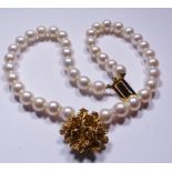 PEARL BRACELET. Double strand pearl bracelet with 9ct gold clasp