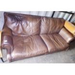 FOUR SEATER LEATHER SETTEE. Brown four seater leather settee