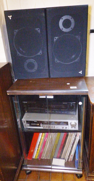 STEREO CABINET AND SPEAKERS. Glazed stereo cabinet with Mitsubishi speakers, stereo deck and various
