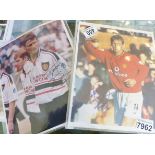 SIGNED PHOTOGRAPHS. Two signed sporting photographs of Teddy Sheringham