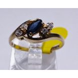 GOLD SAPPHIRE AND CZ RING. 9ct gold marquise cut sapphire and CZ ring, size O