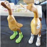 WOODEN DUCKS. Pair of large wooden ducks in Doc Martin boots, H ~ 46cm