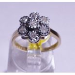 GOLD DAISY CLUSTER RING. 9ct gold diamond daisy cluster ring, solid shank, size J