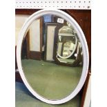 OVAL BEVELLED EDGE MIRROR. Painted framed oval bevelled edge mirror 89 x 57cm