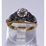 GOLD AND PLATINUM SOLITAIRE RING. 18ct gold and platinum antique diamond solitaire ring, size H