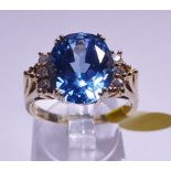 BLUE STONE DRESS RING. 14ct gold large blue stone dress ring, size Q