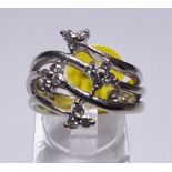 GOLD FLOWER RING. 14ct white gold diamond flower ring, 0.40ct, size M