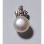 SILVER CULTURED PEARL PENDANT. Sterling silver cultured pearl and CZ pendant