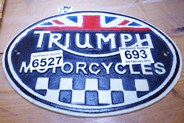 CAST IRON TRIUMPH SIGN. Cast iron Triumph sign, D ~ 22cm