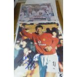 SIGNED PHOTOGRAPHS. Two signed sporting photographs of Teddy Sheringham