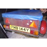 ROAD TRAILER. Steel framed road trailer with spare wheel and cover