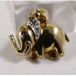 9CT RUBY AND DIAMOND PENDANT. 9ct gold ruby and diamond set elephant pendant