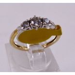 9CT DIAMOND RING. 9ct gold 0,25ct three stone diamond ring, size K/L