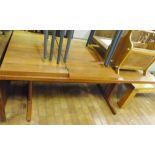 DINING TABLE. Medium oak rectangular dining table with inlaid leaf design and two extending