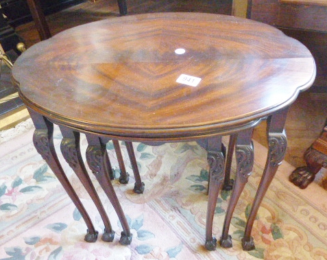 NEST OF TABLES. Oak nest of three tables on ball and claw feet