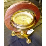 COMPASS. Brass compass on brass and wooden stand H ~ 24cm