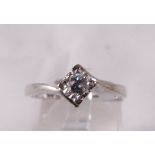 9CT SOLITAIRE RING. 9ct white gold 0.15ct diamond solitaire ring, size N