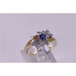 9CT GOLD RING. 9ct gold sapphire and diamond ring, size K/L