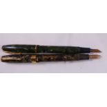 CONWAY STEWART FOUNTAIN PENS. Two Conway Stewart fountain pens with 14ct gold nibs, numbers 15 and