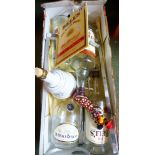 ALCOHOL BOTTLES. Courvoiser, Bells and Smirnoff bottles
