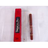 SWAN MABIE TODD PENS. Two Swan Mabie Todd fountain pens, one in original box including ladies