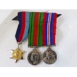 MEDAL TRIO. WWII miniature medal trio