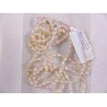 PEARL NECKLACE. Three strand freshwater pearl necklace