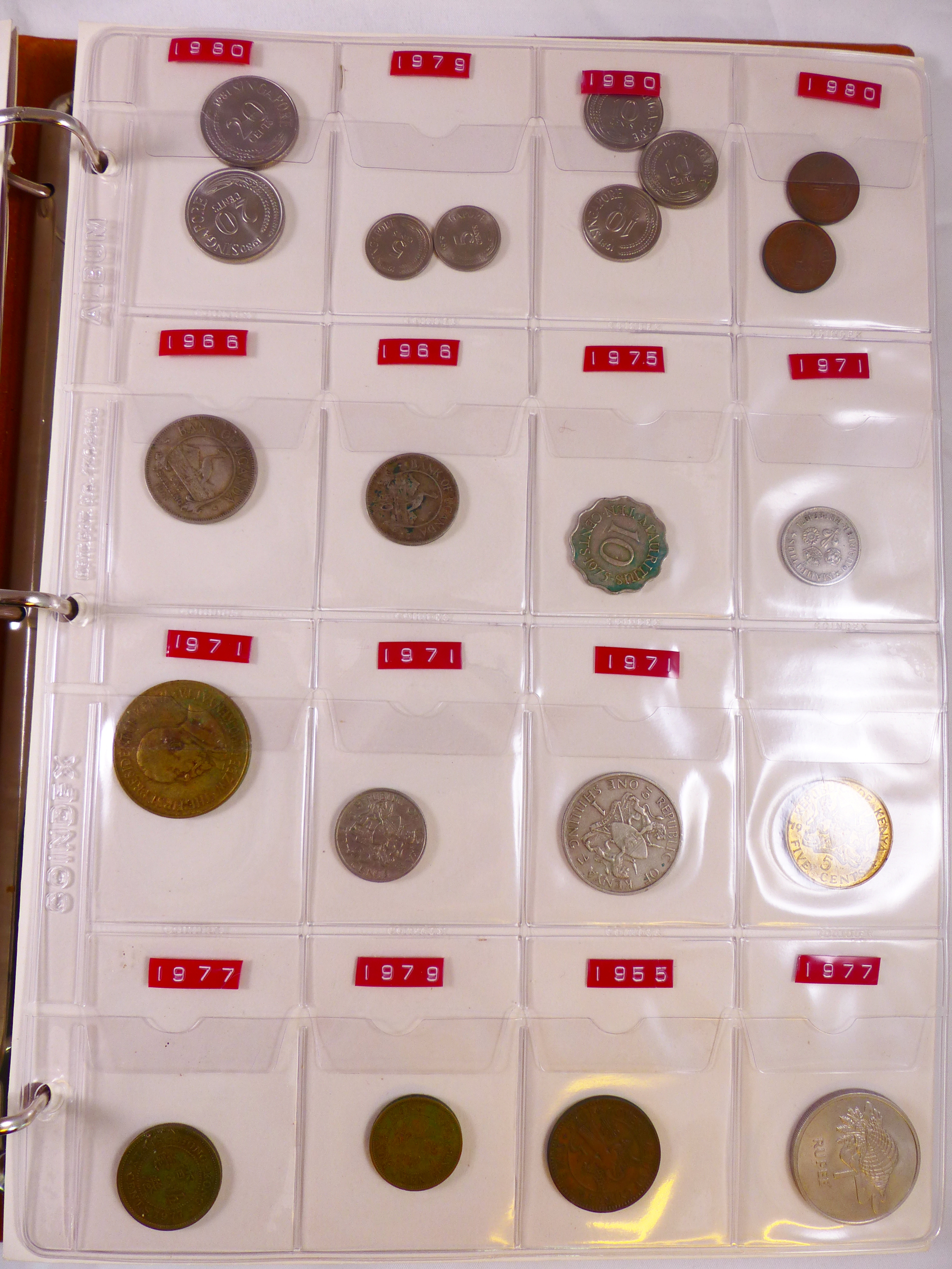 COINS. Folder of mixed world coins