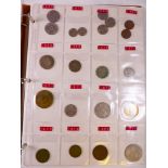 COINS. Folder of mixed world coins