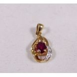 9CT GOLD PENDANT. 9ct gold synthetic ruby and diamond pendant