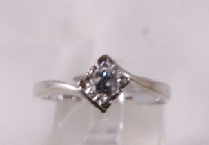 9CT SOLITAIRE RING. 9ct white gold 0.15ct diamond solitaire ring, size N