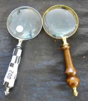 MAGNIFYING GLASSES. Two small magnifying glasses, one brass and one mother of pearl